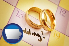 iowa map icon and wedding day plans, with gold wedding rings