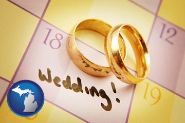 wedding day plans, with gold wedding rings - with Michigan icon