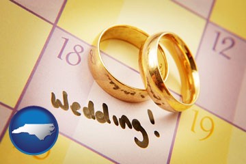 wedding day plans, with gold wedding rings - with North Carolina icon