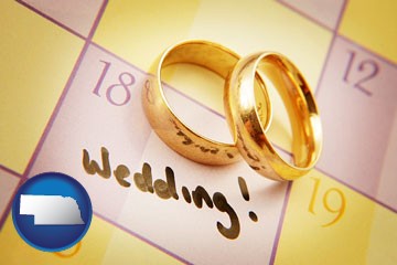 wedding day plans, with gold wedding rings - with Nebraska icon