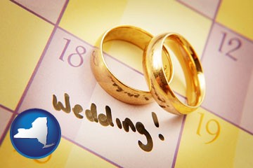 wedding day plans, with gold wedding rings - with New York icon