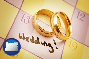 wedding day plans, with gold wedding rings - with Oregon icon